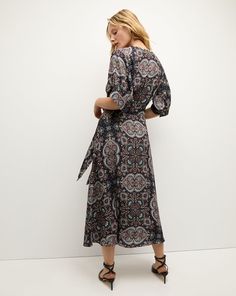 An effortlessly chic midi, the V-neck Wyatt features a cinched-in waist and a kaleidoscopic bohemian print. Pair with sandals for day; switch to heels for date night.100% PolyesterDry clean onlyStyle #2407CP4421054 Bohemian Print, Plus And Minus, Midi Length Dress, Veronica Beard, Midi Length, Date Night, Print Dress, The Dress, V Neck