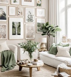 a living room filled with lots of pictures on the wall above a couch and coffee table