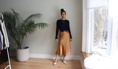 Luxurious, opulent, sumptuous, lavish, classy - these are just some of the words that come to mind when I think about slip skirts. Find out how to style them here. How To Style Satin Slip Skirt, How To Style A Slip Skirt For Work, Turtleneck Slip Skirt, Satin Slip Skirt And Sweater