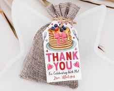 a thank you bag with some pancakes on it