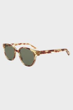 First made famous in the 1950s this sunglass is now a classic. The round lens fits in a sleek frame with a high hinge. Made of quality acetate plastic with double studs on the frame ends. u00a0 u00a0 u00a0 u00a0 u00a0u00a0 RX Optical Quality SIZE 48mm Eye Size 20mm Bridge 150mm Temple/Arm 5 1/2" Width 1 7/8" Height | Sunglass Museum Vintage Jackson Horn Rim Sunglasses in Blonde Tortoise, Women's at Urban Outfitters Double Stud, The 1950s, Tortoise, Horn, Vintage Shops, Urban Outfitters, Temple, Bridge, Blonde