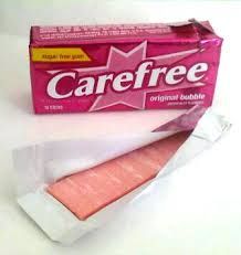 a box of carefree original bubble soap next to it's wrapper on a white surface