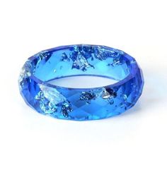 These adorable Colored Resin Rings are perfect for everyday wear. A dashing touch to your accessories and a great way to support animals at risk. You will not only receive compliments but also help to protect our wildlife. This is perfect for you, or as a gift for a loved one. Limited stock, get yours before they're gone Help us raise awareness of the threats animals face. With every Necklace sold you help saving animals across the globe! Help us Save them! Dried Flower Epoxy, Ring Diy Handmade, Epoxy Ring, Flower Epoxy, Ar Glasses, Piercings Jewelry, Saving Animals, Resin Rings, Edgy Jewelry