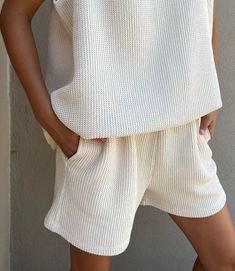 Our seasonless favorite, the go-to Chloe Shorts, created in an exquisite 100% cotton knitted rib - is our take on a classic style reimagined in our most luxurious fabrication to date. Our Knitted Cotton Rib is a substantial & textural classic knit, inspired by some of our most beloved vintage pieces throughout the years - only to age gracefully and to become softer with wear. In this iteration, we added side pockets for ease and kept the fit edited yet relaxed. We love pairing the Chloe Shorts w Summer Lounge Wear, Loungewear Outfits, Age Gracefully, Loungewear Luxury, Ribbed Shorts, Loungewear Sets, Summer Knitting, Mom Outfits, Knit Set