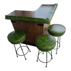 Mid-Century Solid Wood and Leather Décor Green Bar  Add a splash of vintage style to your home with this fantastic mid-century green bar! It features a bold green color that makes it a standout piece, perfect for any space looking to blend retro charm with modern elegance.  Design: Sleek mid-century modern lines with tapered legs Condition: Excellent; well-maintained Features: Ample storage for bottles and glassware  Dimensions:   This bar is ideal for entertaining or as a unique statement piece in your living area. Don’t miss out on the chance to own this eye-catching and functional piece of mid-century design.  Message me for more details or to arrange a viewing! 70s Bar Decor, 50s Moodboard, 1920s Bar, Retro Home Bar, Mid Century Modern Bar Cart, Modern Basement Bar, Mid Century Modern Bar, Reclaimed Wood Desk, Home Cocktail Bar