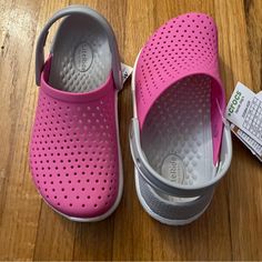 Great Item. Pink Color Clogs. New With Tags But No Box. Size: J1 Plastic Slide Clogs For Summer, Casual Plastic Clogs For Spring, Casual Closed Toe Plastic Clogs, Pink Clogs With Rubber Sole For Outdoor, Pink Slip-resistant Round Toe Sandals, Casual Pink Slip-on Clogs, Plastic Slip-on Clogs For Spring, Pink Non-slip Closed Toe Clogs, Casual Pink Non-slip Clogs