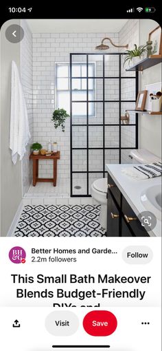 a bathroom with white tile and black accents