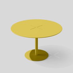 a round table with an x on the top in yellow, viewed from the side