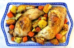 chicken, potatoes and carrots in a blue dish