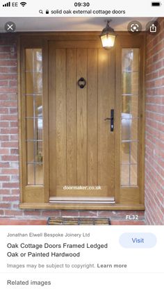 the front door to a brick house with glass panels and an insulated window above it