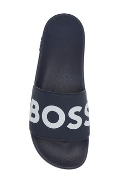 With a cushy insole, this casual slide sandal offers lasting comfort to be a weekend wardrobe favorite. Textile upper and lining/rubber and synthetic sole Made in Italy Hugo Boss/BOSS/HUGO has received the Fair Labor Association accreditation, which signifies that the company has effective systems and procedures in place to successfully uphold fair labor standards throughout its supply chains, including strategies and tools to address and improve working conditions Casual Slip-resistant Slides For Leisure, Slip-resistant Synthetic Flat Slides, Casual Slide Sandals With Branded Insole, Casual Slip-on Slides With Ortholite Insole, Casual Tpr Slides For Summer, Casual Slip-resistant Slides Made Of Tpr, Casual Flat Flip Flops With Ortholite Insole, Casual Slip-resistant Tpr Slides, Casual Flat Slides For Swimming