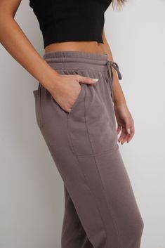 A part of our Simply Soft collection, this sporty-chic jogger is a charming choice to wear to work, weekend, and wherever else your life will carry you! These are a mid-rise fit, designed with a snug, elastic waistband and drawstring to adjust them to your desired comfort. You’ll fawn over these for many reasons, and their practicality may top that list: front and back pockets give you a little extra storage room for keys and other essentials. Their tapered leg is capped off with a soft self-cuf Bolero Cardigan, Bolero Dress, Fashion Joggers, Loungewear Shorts, Wear To Work, Storage Room, Sporty Chic, Slim Waist, Extra Storage