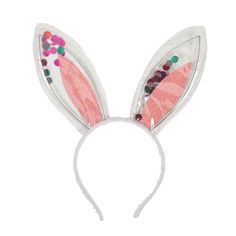 LESS THAN PERFECT: I am less than perfect because the clear plastic on my ears is turning cloudy. If you still think I would be a great costume addition or giveaway, you can pick me up at a fraction of my original price!Did some-bunny say, "Unique and trendy Easter accessories"? We're all ears! These bunny ears are made of clear plastic revealing iridescent sequins on the inside. Use the Easter bunny ears as egg hunt giveaways or photo booth props, or tuck one pair in each kids' Easter basket! Your little bunnies will love hopping around in the Easter headbands. Metal and plastic. 5 1/2" headband with 6" ears. Easter Accessories, Trendy Easter, Easter Headbands, Bunny Ears Headband, Easter Bunny Ears, Kids Easter Basket, Easter Toys, The Easter Bunny, Ears Headband