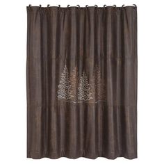 a brown shower curtain with trees on it