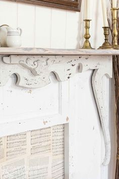 repurposed door turned into a faux fireplace also using old furniture pieces Flat Faux Fireplace, Faux Fireplace Diy Easy, Diy Fake Fireplace, Diy Fireplace Ideas, Fake Fireplace Diy, Fireplace Surround Diy, Diy Faux Fireplace, Diy Mantle