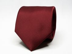 A classy solid Burgundy tie, perfect for matching groomsmen ties! Size: 8cm wide (3.15in) Color: Burgundy Pattern: Solid These neckties are dry clean only. Our shop has a huge selection of ties, pocket squares, cufflinks and other suit accessories. For more of our suit accessories, please visit our shop: https://www.etsy.com/ca/shop/GentlemensEra If you have any questions or concerns, please contact us and we will be able to assist you. Instagram: https://www.instagram.com/the.gentlemens.era If Classic Red Suit And Tie Accessories For Groom, Elegant Red Suit And Tie Accessories For Groom, Red Standard Tie For Wedding, Classic Red Tie For Formal Occasions, Classic Red Ties For Formal Occasions, Red Standard Tie For Wedding Suit, Classic Red Suit And Tie Accessories For Wedding, Red Wedding Tie And Suit Accessories, Classic Red Suit And Tie Accessories For Semi-formal Occasions