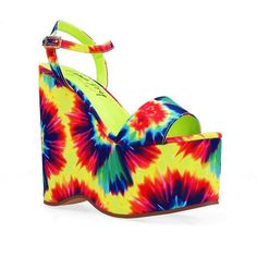 Say hello to POP! Tie-dye platform wedges with a fabric top, and man-made sole, and excellent for any woman wishing to add a bright, exciting flair to her wardrobe. They're simple to put on and off thanks to their ankle strap fastening and slip-on design, making them ideal for everyday wear. The tie-dye pattern gives any ensemble a distinctive and playful touch, and the higher platform makes them both cozy and fashionable. These wedges are likely to draw attention because they are imported for a Summer Trendy Fabric Heels, Trendy Summer Fabric Heels, Trendy Fabric Heels For Summer, Bold Summer Sandals With Wedge Heel, Bold Wedge Heel Sandals For Summer, High Heel Fabric Wedge Sandals With Platform, Bold Summer Platform Wedge Sandals, Bold Platform Wedge Sandals, Bold Platform Wedge Sandals For Summer