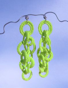 Discover the Fluo pendant earrings in neon green for the colour-blocking fanatic. They're lightweight and stylish, perfect attributes for choosing the perfect earring.

The authentic Fluo earrings are handmade with crocheted threads embellished with a sterling silver post.

They are a one-of-a-kind piece created according to the inspiration of the moment.

Colours may differ depending on your screen resolution. Handmade Neon Yellow Jewelry For Summer, Green Crochet Jewelry, Handmade Neon Jewelry For Summer, Bold Handmade Green Jewelry, Colorful Website, Colour Blocking, Textile Jewelry, Gift Card Sale, Pendant Earrings