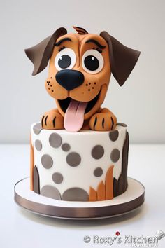 a cake with a dog sitting on top of it