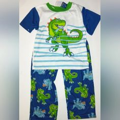 New With Tags Toddler Size 5t Cute 2 Piece Pajama Set Perfect For Spring & Summer. Lightweight So Kiddo Won't Overheat. Slip On Pants & Matching Short Sleeve T-Shirt. Flame Resistant Sleepwear Perfect Set For Little Girl Or Little Boy That Loves Dinosaurs #Unisex #Jammies #Newpajamas #Dinos #Summersets Pokemon Pajamas, Spring Pajamas, Purple Pajamas, Flannel Pjs, Baby Boy Pajamas, Unisex Pajamas, Fleece Pajama Pants, Dog Pajamas, Dinosaur Theme