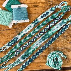 some green and white string on a wooden table