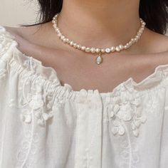 Sweet baroque pearl necklace At first sight, this baroque pearl choker can make people directly feel the meaning of sweet, delicate, and elegant. If you're looking for a real pearl necklace to go with your off-the-shoulder dress, square-neck tee, or anything without a collar, this is the right pearl necklace for women to wear. With a small but noticeable size, this 5-6mm baroque freshwater pearl necklace looks shiny and personal. The baroque pearl choker also comes with an eye-catching design: a Delicate Pearl Choker With Pearl Charm, Delicate Pearl Choker Necklace With Pearl Charm, Classic Baroque Pearl Necklace With Pendant, Delicate White Pearl Drop Choker, Dainty Pearl White Pearl Choker, Pearl Choker Necklace With Pearl Charm, Baroque Pearl Choker With Pearl Charm As Gift, Baroque Pearl Choker Necklace With Pearl Charm, Delicate Pearl Choker With Pearl Pendant