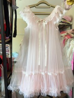 Designer Brand: August Unicorn Peiliee Co.,Ltd is the original retailer of designer brand August Unicorn Size: S: length: 85cm, bust: up to 120cm M: length: 80cm, bust: up to 120cm 100% handmade for orders, 1-2 weeks making time Notice: This outer dress is transparent, needs inner dress Please notice that we cannot take return or exchange on all customized items For customized sizing, please email us your size measurements for bust, waist, hips, height and dress length you wish to info@peilieesh Babydoll Dress Nightwear 60s, Pink Sheer Feminine Dress, Feminine Sheer Pink Dress, Pink Sheer Daywear Dresses, Pink Sheer Dress For Daywear, Sheer Pink Dresses For Daywear, Feminine Sheer Tulle Dress, Pink Sheer Lace Dress, Pink Sheer Sleeveless Mesh Dress