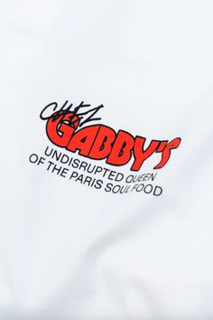 the back of a white t - shirt that says gabby's undisrupted queen of the paris soul food