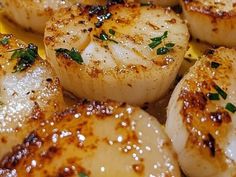 sea scallops with herbs and seasoning on them