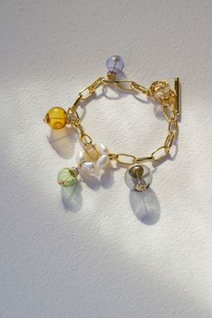 After waiting for 6 months to get these very unique and beautiful lampwork balls, we finally made a collection out of them, just in time for Christmas. 14k Goldfilled (Contains 5% Gold inside) Swarovski Crystals Lampwork Ball Glass Beads Freshwater Pearls Length: 7" 100% Handmade with 100% JOY *Limited Edition Gold Glass Beaded Bracelets, Yellow Gold Jewelry With Large Beads For Gift, Gold Glass Beaded Bracelets With Colorful Beads, Gold Beaded Bracelets With Colorful Glass Beads, Gold Glass Bracelets, Gold Glass Round Bracelets, Handmade Yellow Gold Beaded Bracelets For Jewelry Making, Unique Gold Beaded Glass Bracelets, Handmade Gold Beaded Glass Bracelets