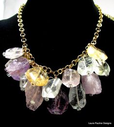 Choker necklaces are in right now! This necklace  consists of faceted nuggets of shimmering light blue aquamarine (25x15mm), shimmering natural pink kunzite (26x17mm), clear faceted citrine (22x19mm) , rose quartz, cape amethyst (17x24mm) and smooth green amethyst ( 24x15mm). They all dangle from a substantial two tier 14k gold filled rolo chain (5mm). Each gemstone has a sparkling faceted blue topaz at the bottom and is wire wrapped  onto the chain with14k gf headpins. The lobster clasp is 14k Multicolor Multi-stone Amethyst Jewelry, Multi-stone Amethyst For Jewelry Making, Multicolor Amethyst Gemstone Crystal Necklace, Multicolor Mineral Crystal Jewelry With Stones, Multicolor Briolette Amethyst Jewelry, Multicolor Amethyst Multi-stone Necklace, Multicolor Amethyst Multi-stone Necklaces, Multicolor Amethyst Pendant Jewelry, Multicolor Gemstone Crystals For Jewelry Making