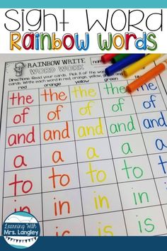 sight word rainbow words worksheet with markers and crayons on the table