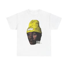 A Tyler the Creator graphic tee with a classic fit, crew neckline, and tear-away label for a comfy, relaxed wear. Perfect for fans of Tyler the Creator looking for a stylish and comfortable addition to their wardrobe. Ideal for casual wear, concerts, music festivals, and everyday occasions. Product features - Made from strong and smooth fabric perfect for printing - Ethically grown and harvested US cotton - Twill tape shoulder tape for stability - Ribbed knit collar for elasticity - Classic fit for a timeless look Care instructions - Machine wash: warm (max 40C or 105F) - Non-chlorine: bleach as needed - Tumble dry: medium - Do not iron - Do not dryclean Tape Shoulder, Streetwear Tops, Fan Shirts, Tyler The Creator, Music Festivals, Music Fans, Hip Hop Music, Knit Collar, Twill Tape