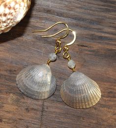 "Stylish earrings with beautiful seashells and faceted labradorite beads. 18K gold plated nickel-, lead- and cadmium-free stainless steel hooks. Measure about 30mm (1,2\") from the lower part of the hook. These earrings will come in a pretty organza gift bag ready for gifting! If you have any questions just convo me and I will get back to you as soon as possible. Thanks for looking // Mari" Labradorite Earrings, Beach Chic, Labradorite Beads, Stylish Earring, Organza Gift Bags, Nature Jewelry, Unique Earrings, Labradorite, Hippie Boho