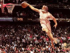 a man is jumping in the air with a basketball