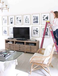 using laser level to hang art above TV Beach House Tv Wall, Tv Area Design, Grid Gallery Wall, Tv Area, Christmas House Tour, New Kitchen Gadgets, Gallery Wall Layout, Best White Paint