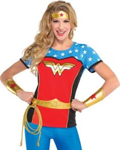 a woman in a wonder costume posing for the camera with her hands on her hips