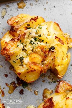 some food that is laying on a pan and has been cooked in the oven for several minutes