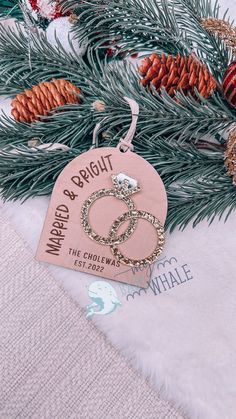 a wooden ornament hanging from a christmas tree