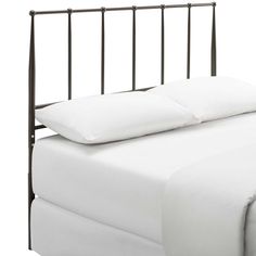 a bed with white sheets and pillows on top of it's headboard, against a white background