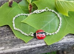 Ladybug Bracelet. Anniversary Gift, Birthday Gift, Bug Bracelet. Ladybug Jewelry. Gift For Mom by TreeTownPaper on Etsy Silver Novelty Charm Bracelet For Birthday, Red Nickel-free Charm Bracelet For Gift, Red Nickel-free Charm Bracelet As Gift, Adjustable Nickel-free Red Charm Bracelet, Red Novelty Jewelry For Birthday, Bug Bracelet, Ladybug Bracelet, Ladybug Jewelry, Black Ladybug