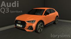 an orange audi q3 sportsback parked in a garage