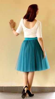 "Women tulle skirt from soft tulle for special occasion. Skirts are made from 4 - 6 layers tulle and soft lining. Elastic waistband for perfect fit and comfort. Each item are handmade and excelent quality. Usually tulle skirt sewing takes about 1 week. Shipping to US - 5 till 7 days, to UK - 4 till 7 days. If you need skirt for a specific date, please write it in the order notes. In first picture model is 5.5ft (1.67 m) tall and wears 24\" (61cm) skirt length (6 layers). The length of the skirt Full Tulle Skirt Fabric, Knee-length Tulle Skirt For Party, Knee-length Tulle Party Skirt, Fitted Tulle Fabric Skirt With Lining, Long Tulle Skirt Fabric, Stretch Knee-length Tulle Skirt, Fitted Tulle Pleated Skirt, Fitted Tulle Mini Skirt, Tulle Mini Skirt Petticoat