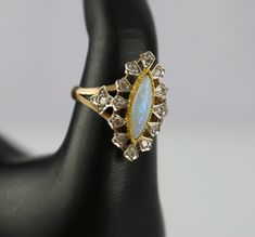 Up for sale is an Antique French Victorian 18K Gold  Opal Rose Cut Diamond Navette Ring  Size: 7. Total Weight：2.8 grams. Hallmark: French eagle's head mark for 18K gold. Great details and well-made. In great condition.  Ready to wear. Please see pictures for details. Domestic shipping is free. Please make sure the shipping address is correct at checkout. We do not accept address change request after sale.  Will be well packaged to make a safe journey to your home. We are happy to answer any questions and always appreciate your business! #784D Navette Ring, Address Change, Antique Jewelry Rings, French Victorian, Safe Journey, Eagle Head, Rose Cut Diamond, Vintage Watches, Rose Cut