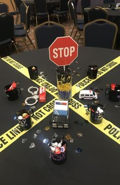 a table with police tape on it that says stop