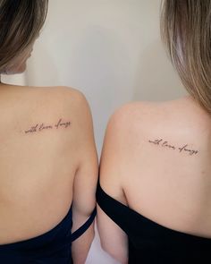 two women with tattoos on their backs that say i will always be happy and never die