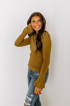 - Give your OOTD a touch of trendy flair with this cutie! - Unlined tight knit material with a ribbed texture - A round neckline - Long bell sleeves - A figure flattering silhouette that ends in a straight hemline Chic Ribbed Fitted Knit Top, Casual High-stretch Ribbed Knit Top, Casual Ribbed High-stretch Knit Top, Trendy Ribbed Long Sleeve Top For Spring, Chic Stretch Knit Top With Ribbed Neckline, Fitted Ribbed Knit Top, Ribbed Stretch Knit Top, Chic Fall Knit Top With Ribbing, Stretch Ribbed Knit Top