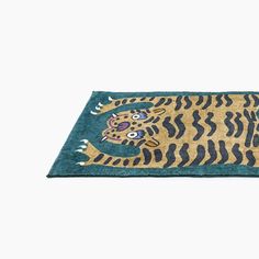 a rug with a tiger design on it