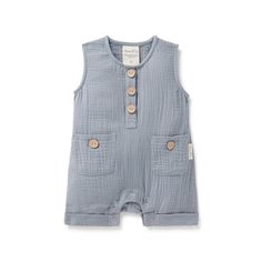 This slate blue organic toddler romper offers a light and airy sleeveless design perfect for warm weather. Featuring coconut buttons on the neckline and snap buttons for easy changes, this romper also has convenient front pockets for storing small treasures. Let your kiddo play and explore in comfort with this soft and stylish addition to their wardrobe. 100% Organic Cotton Muslin Ethically & sustainably made 100% compostable packaging - No plastic here! Muslin Romper, Active Play, Toddler Romper, Sleeveless Rompers, Toddler Boy Outfits, Boy Tees, Short Sleeve Bodysuit, Girls Tees, Muslin Cotton