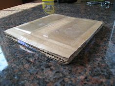 an open laptop computer sitting on top of a counter